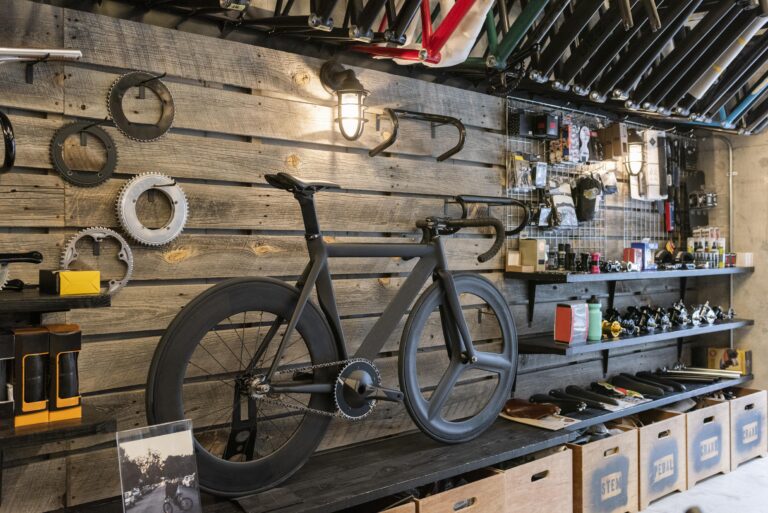 bike service shop concept with bicycle TheHomeQuality