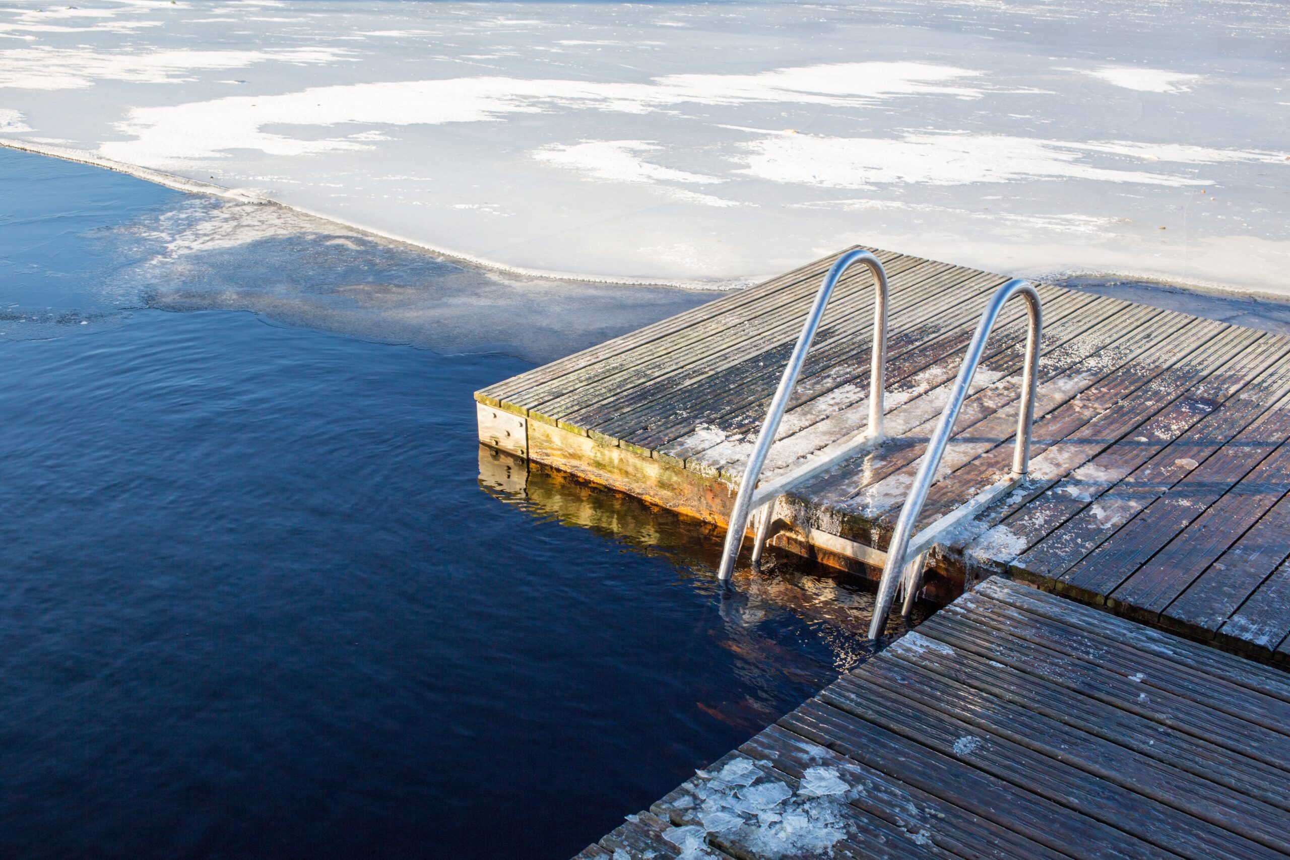 Cold Plunge Pool: 7 Amazing Ways to Boost Recovery (Proven Guide) 1 landscape shot natural ice pool sweden scaled TheHomeQuality