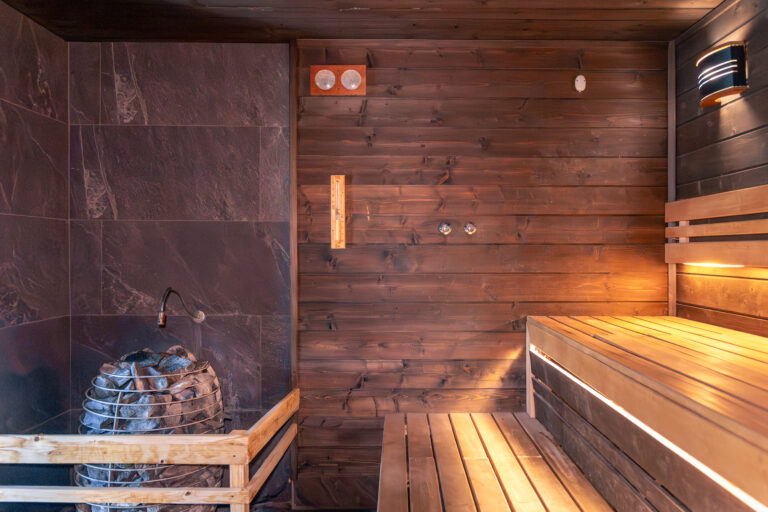 Home Sauna Installation: 7 Best Ways to Boost Resale Value (Proven Guide) 2 sauna with stones thermometer warm benches light nordic wellness TheHomeQuality